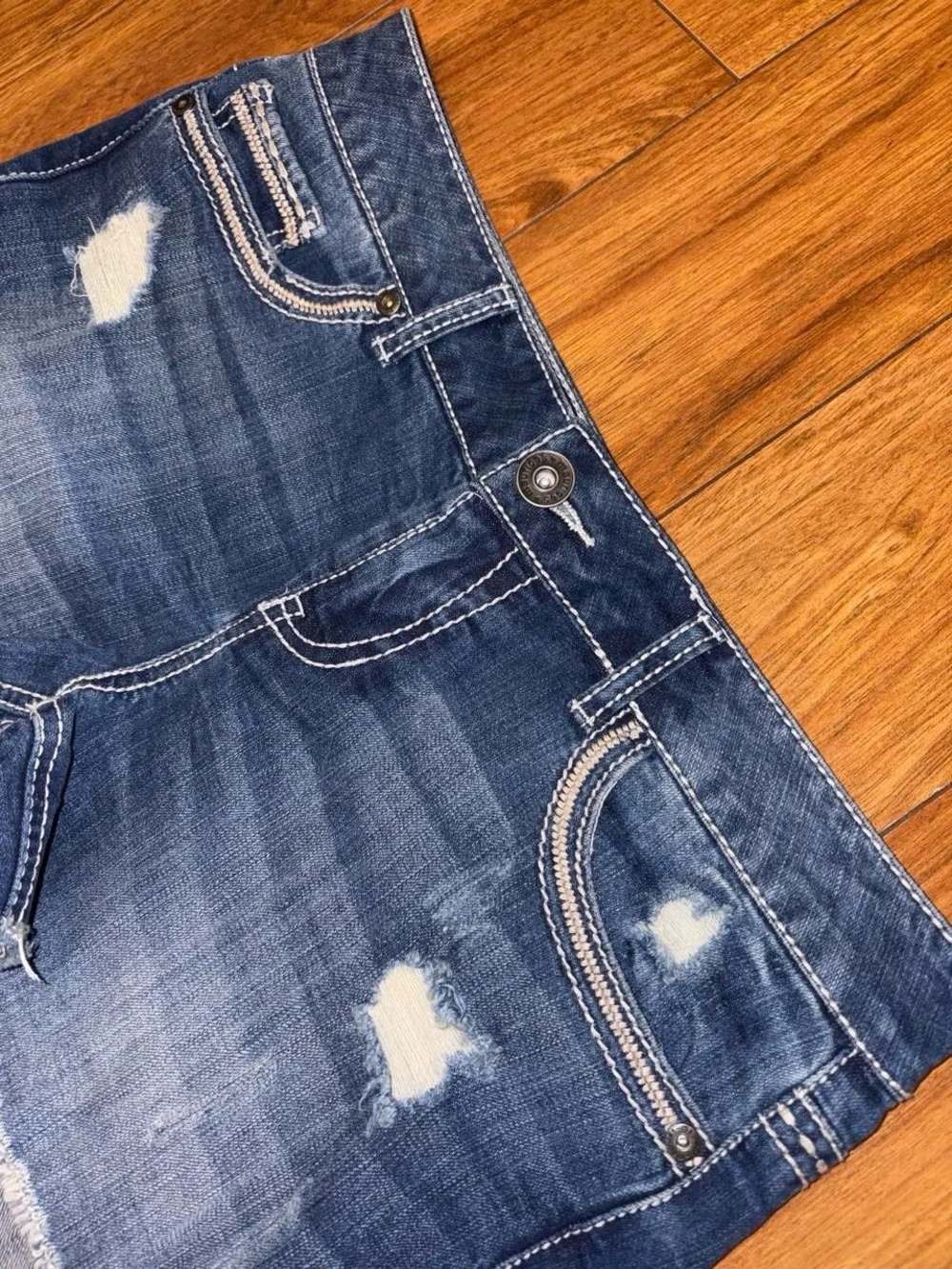 blue denim Y2K shorts with white stitching